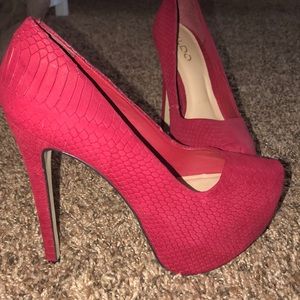 Red Aldo pumps